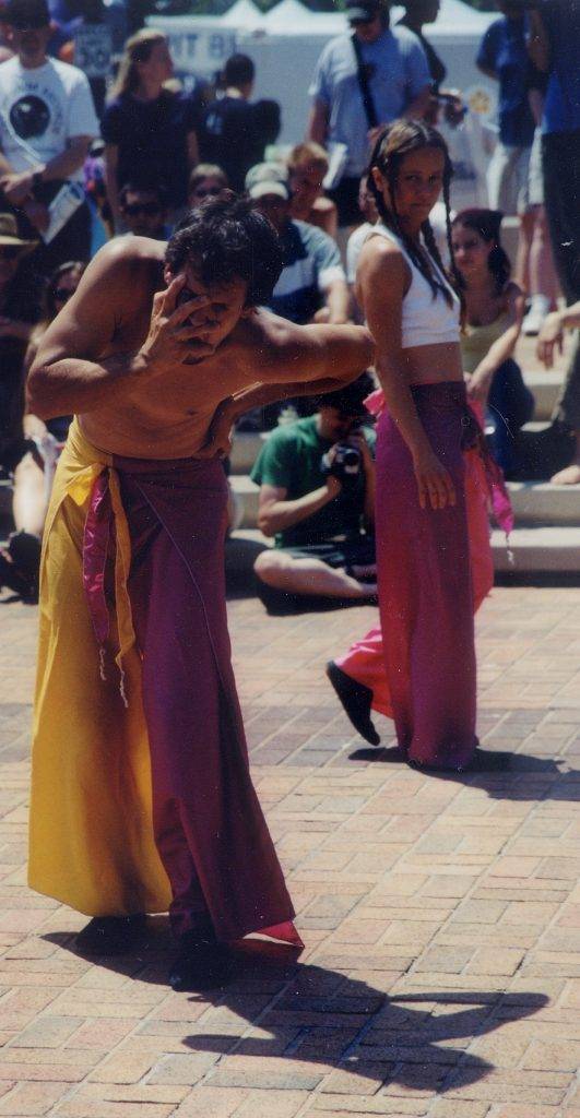 Steven Dewey and Julie M. Anderson perform with aminibigcircus at Baltimore's Artscape 2000
