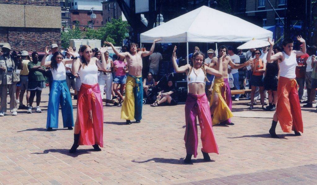 Julie M. Anderson, Marissa DeVita, Steven Dewey, Darek Scottie Russell, Christy Thorndill, and Melissa Webb perform with aminibigcircus at Baltimore's Artscape 2000