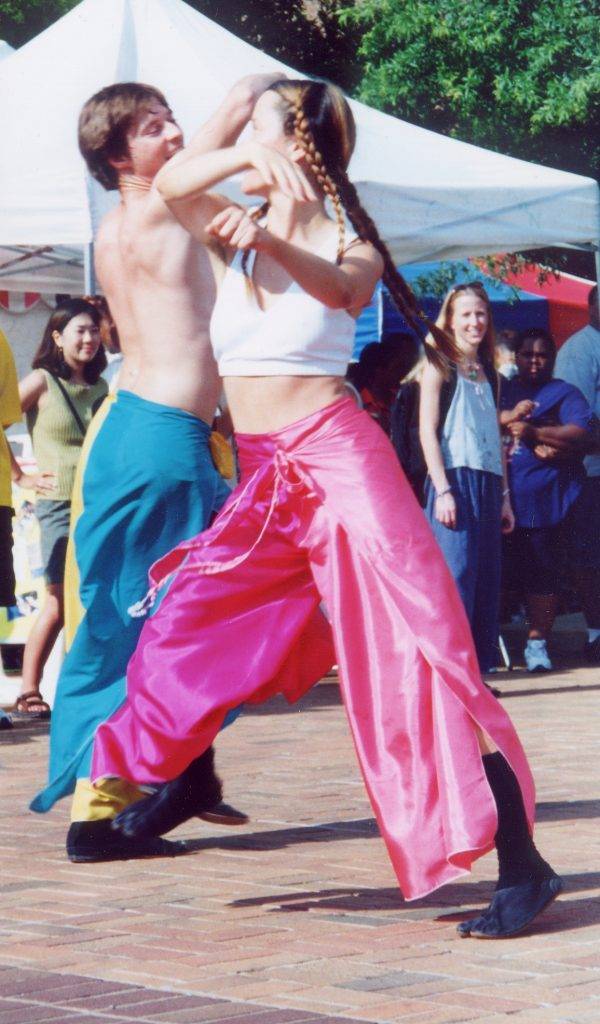 Julie M. Anderson and Darek Scottie Russell perform with aminibigcircus at Baltimore's Artscape 2000